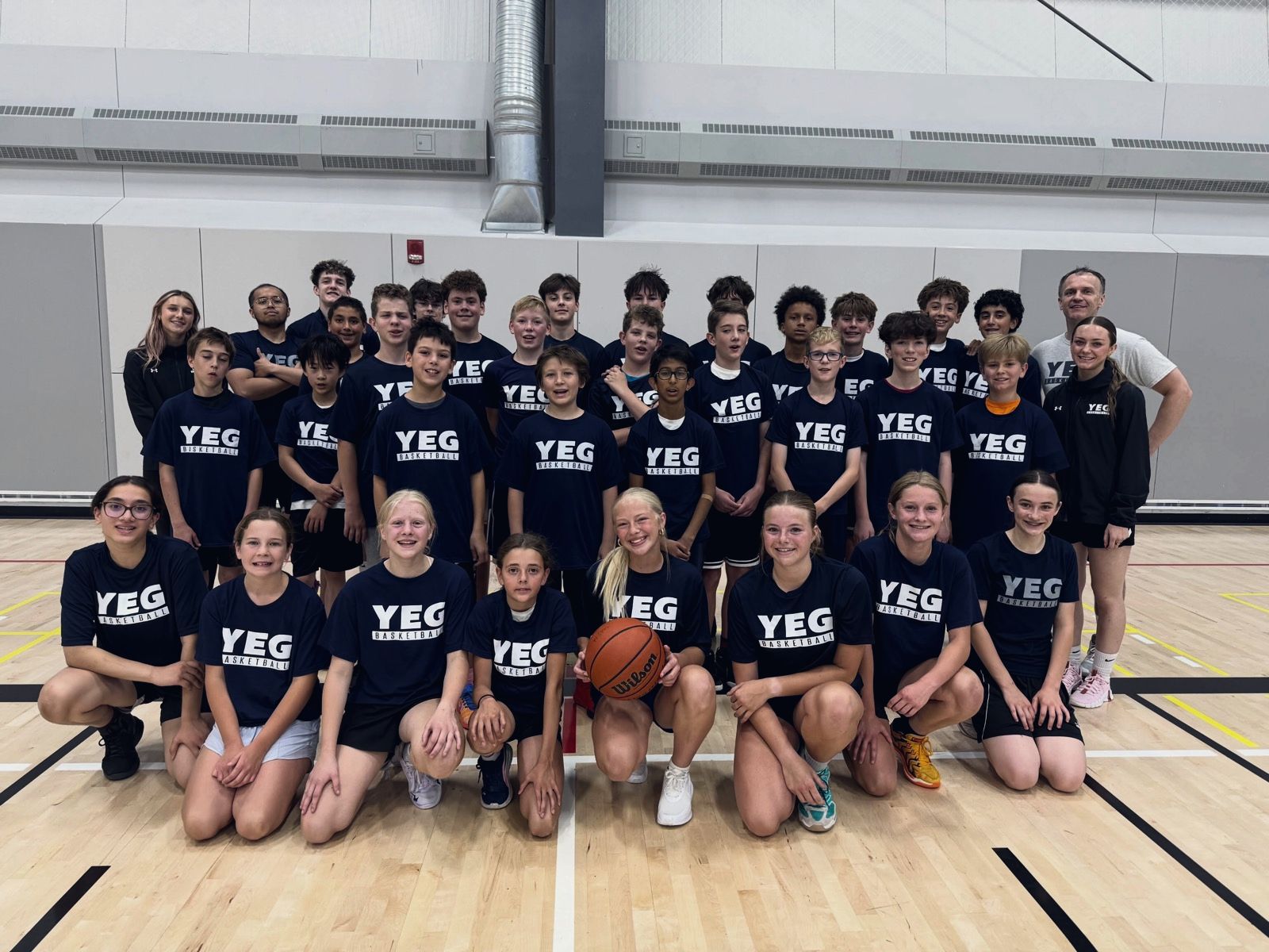 Summer camp players with YEG BASKETBALL shirts